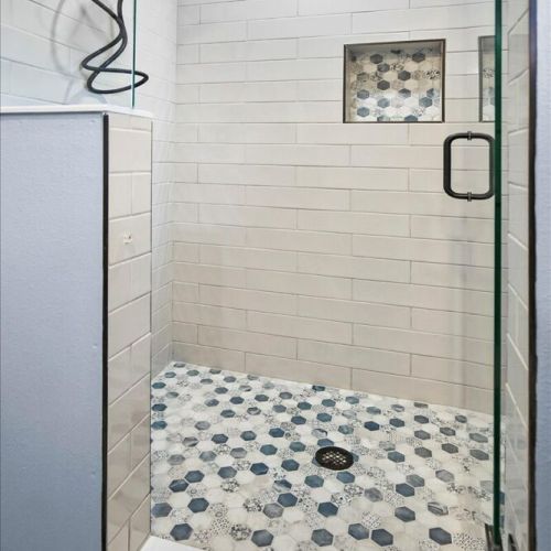 Stand up and tiled shower.